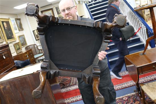 A pair of George I style walnut and parcel-gilt dining chairs